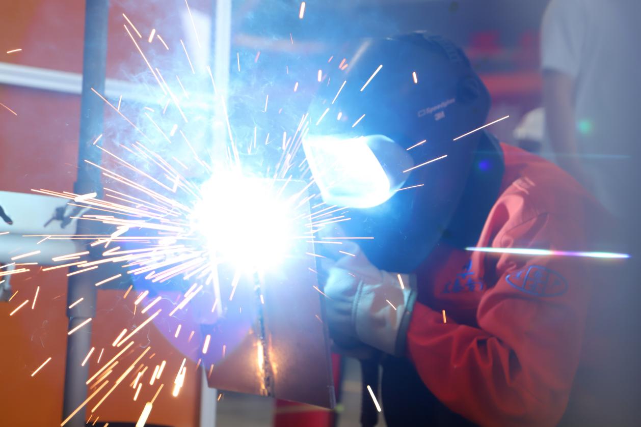 Welder competing in the 2026 Huanghua Welding Skills Competition at HCSV