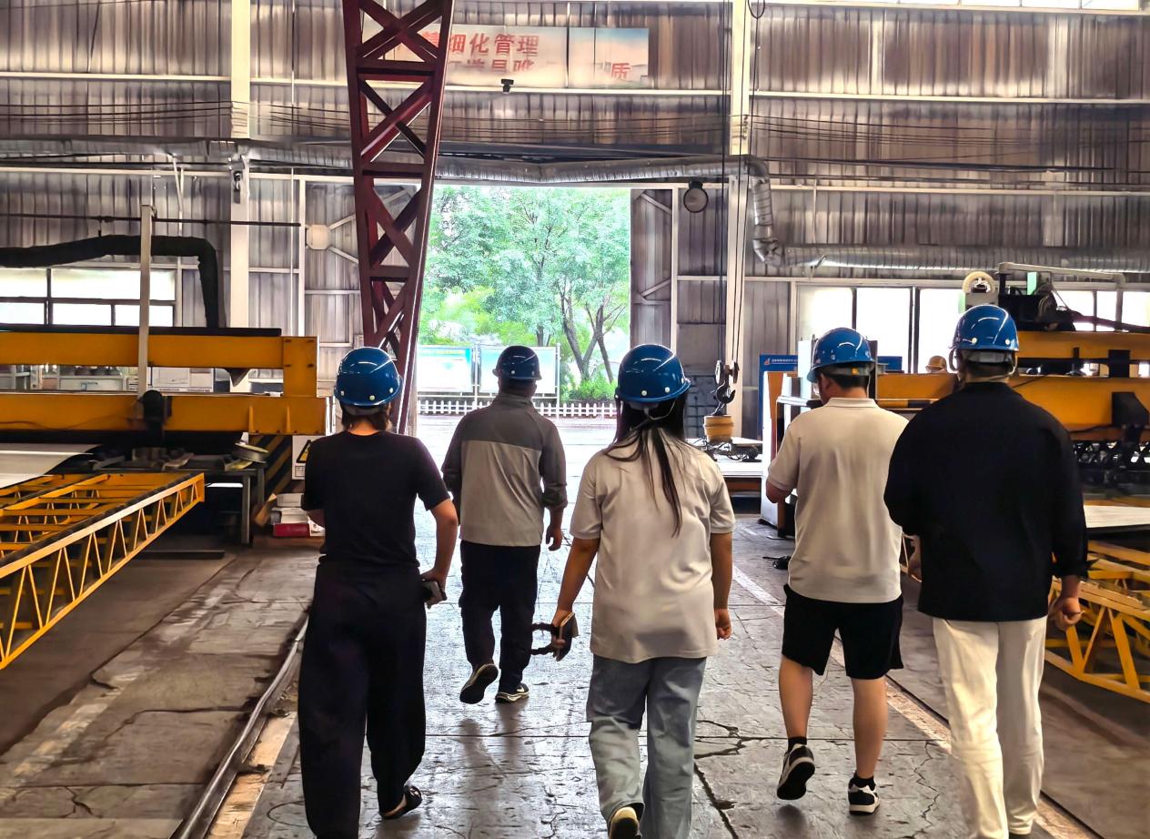 HCSV international sales team touring the tanker manufacturing workshop during specialized product training HCSV international sales team touring the tanker manufacturing workshop during specialized product training