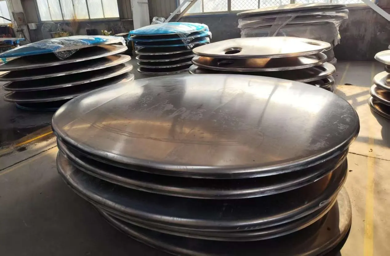Aluminum tanker trailer tank heads and components prepared for manufacturing process Aluminum tanker trailer tank heads and components prepared for manufacturing process