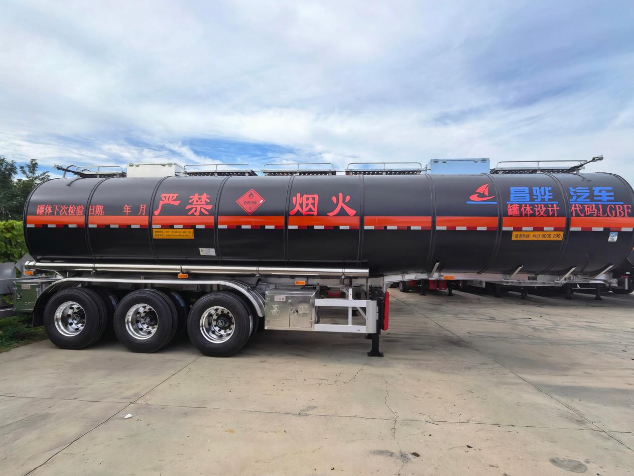 black HCSV flammable liquid tank trailer with a protective exterior coating black HCSV flammable liquid tank trailer with a protective exterior coating